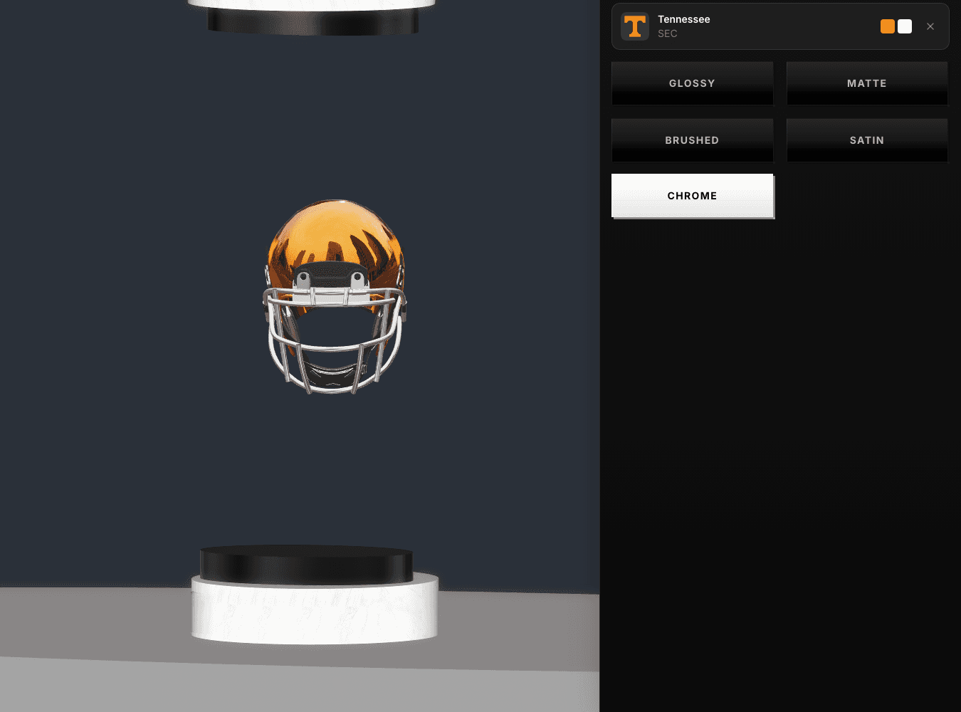 Helmet Studio — a chrome Tennessee helmet in the 3D customizer with glossy, matte, brushed, satin, and chrome finish options